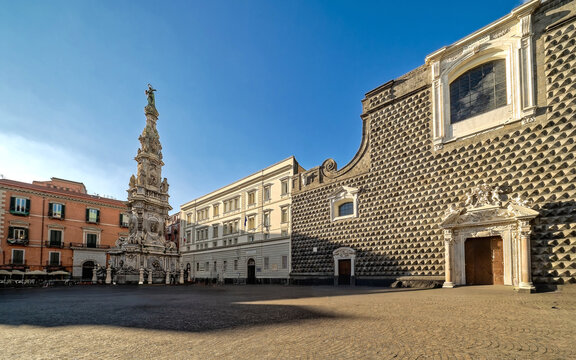 The Baroque Guglia dell'Immacolata obelisk and the unique Ges&ugrave; Nuovo church facade in Naples