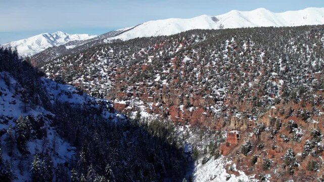Aerial view of snowy Utah canyon in winter in the Uinta National Forest.