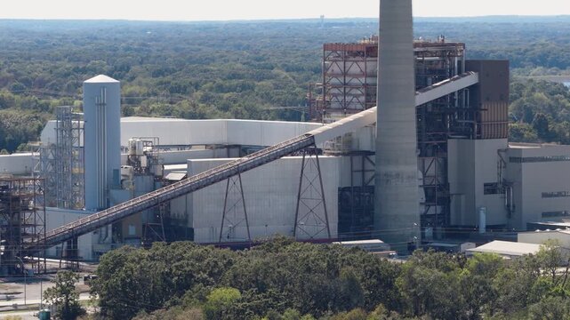 Coal-fired Facility Of The Flint Creek Power Plant Near Gentry In Arkansas, United States. Aerial Sideways Shot