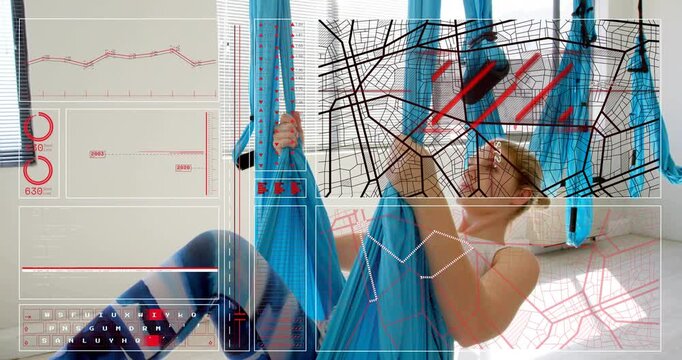 woman gripping aerial yoga hammock when fitness HUD fading in guiding inversion before receding
