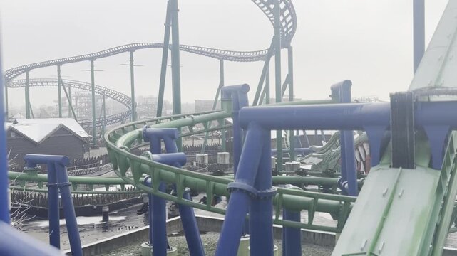 Roller coaster tracks in winter amusement park