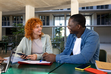Diverse colleagues collaborating in modern workspace