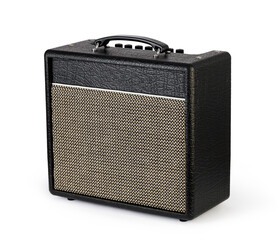 Black guitar amplifier producing sound for music performance