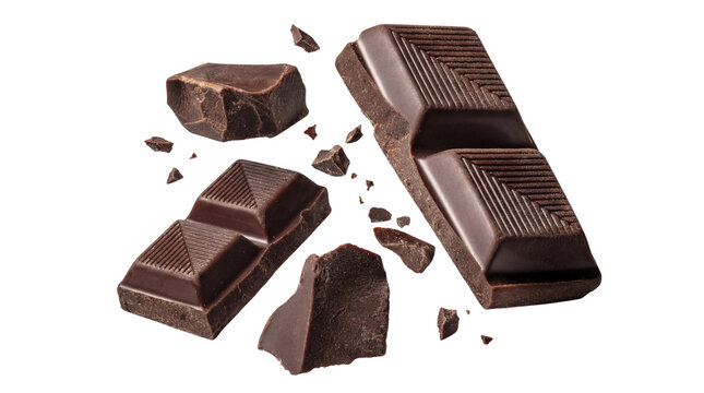 a selection of broken dark chocolate bar pieces and crumbs floating on a transparent background.