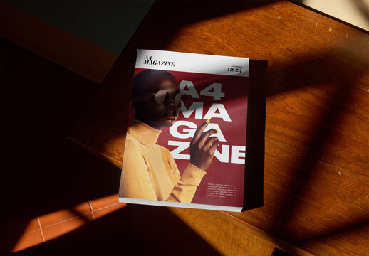 Mockup Of A4 Magazine With Customized Front Cover On Table