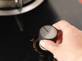 Fototapeta premium Improper use of gas stove switch
