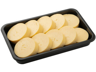 Egg tofu (tamago tofu) sliced into seven thick, evenly cut round discs, arranged loosely inside a matte black plastic food tray