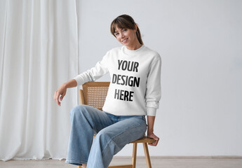 Mockup Of Woman Wearing Customized Sweatshirt On Chair