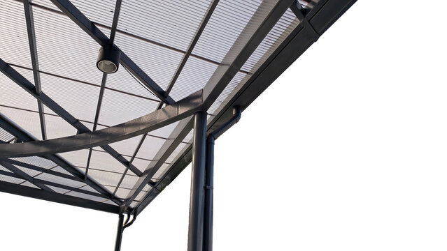 Modern architectural canopy featuring black steel frame translucent polycarbonate roofing and integrated drainage system with downspouts and gutters. Isolated on transparent background