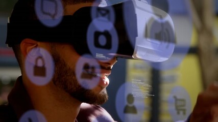 Animation of digital icons over caucasian businessman wearing vr headset - Powered by Adobe