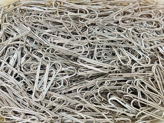 Wire clips are used to hold paper together.