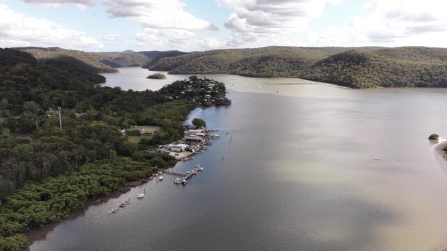 Hovering over Motorway 1 in Australia across Broken Bay Mooney Mooney village.