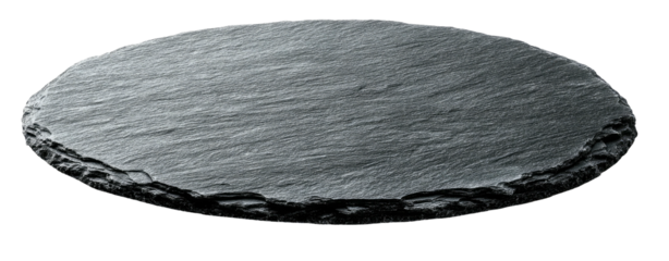 A round, dark gray, rough-edged, slate-like serving board floating on a black background