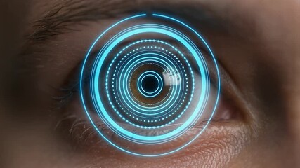 Human eye opening with futuristic scan overlay, technology footage representing biometric security and innovation. - Powered by Adobe