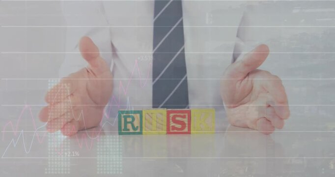 Animation of graphs and numbers, midsection of caucasian businessman with risk text on wooden blocks