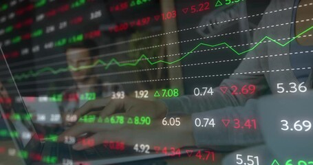 Animation of financial data processing over businesswoman using laptop - Powered by Adobe