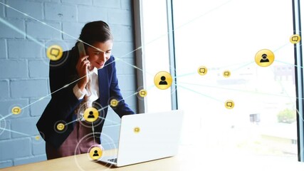 Animation of network of digital icons over caucasian businesswoman talking on smartphone at office - Powered by Adobe