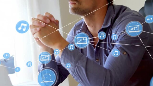 Animation of network of connections with icons over caucasian man with vr headset