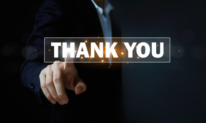 Businessman pressing virtual thank you button on digital interface, showing appreciation, gratitude, customer service, business communication, technology concept with copy space on dark background.