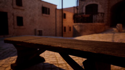 A rustic wooden bench sits in a charming courtyard during sunset, surrounded by old stone buildings and cobblestone streets. Soft light enhances the warm atmosphere of the setting.