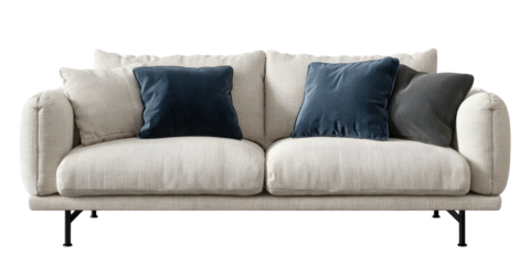 A cozy two-seater couch with soft, cream-colored fabric and dark blue accent pillows