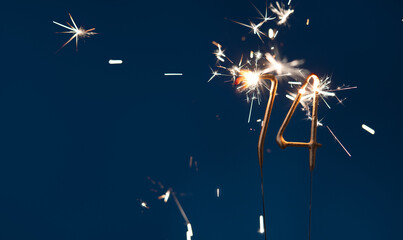 74 years celebration festive background made with Bengal fires in the form of number Seventy four.