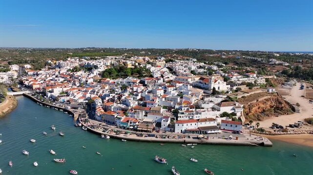 Aerial video from the little touristic town Ferragudo in the Algarve Portugal