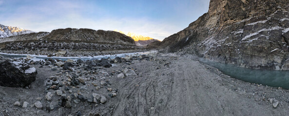 a beautiful mountain river in a snowy gorge. highlands. winter in the mountains