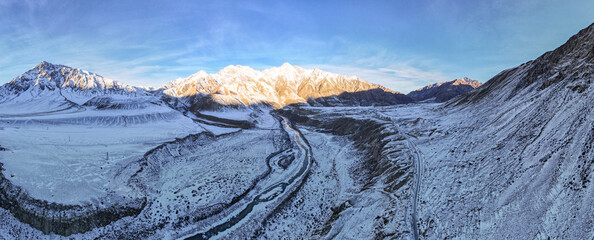 a beautiful mountain river in a snowy gorge. highlands. winter in the mountains