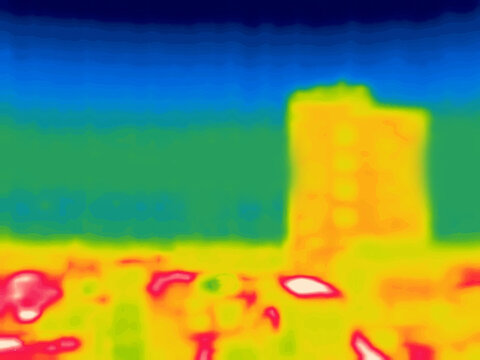 City. Houses and palaces on a hot day.. Image from thermal imager device.