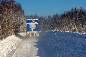 The icy winter road runs around the Arctic circle. The tundra is traversed only in winter, there is no road in summer. The Arctic 4x6 will only pass the truck.