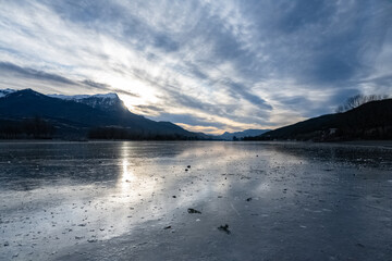 Embrun, beautiful city in France, in the Hautes-Alpes, the Serre-Poncon lake frozen in winter
