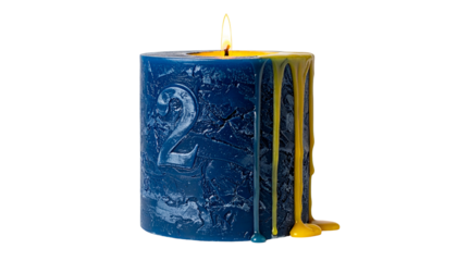 A blue candle with the number "2" in relief, melting wax, and a burning flame