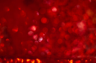 Vibrant Red Abstract Bokeh Background with Circles and Light Effects