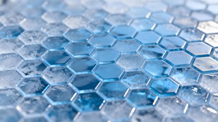 Close-up of blue hexagonal mosaic tiles with reflective surface