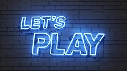 Neon Lets Play Sign on Brick Wall.