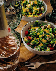 Gourmet salad with strawberries, arugula and avocado, top view. High quality photo