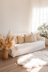 White Sofa With Beige Pillows And Pampas Grass In A Cozy Living Room