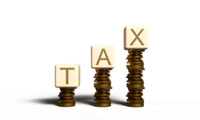 Tax day cube block wooden square coin money financial taxation tax time accounting deadline income payment government refund budget tax day 15 april month economy reminder tax day revenue taxation 