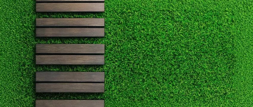Dark wooden stepping planks laid across  vibrant green artificial turf or grass texture