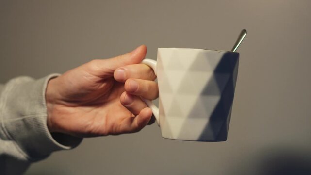 Close-up of hot tea in a white glass mug.
Liquid in the cup.
Ceramic mug and liquid in the cup.