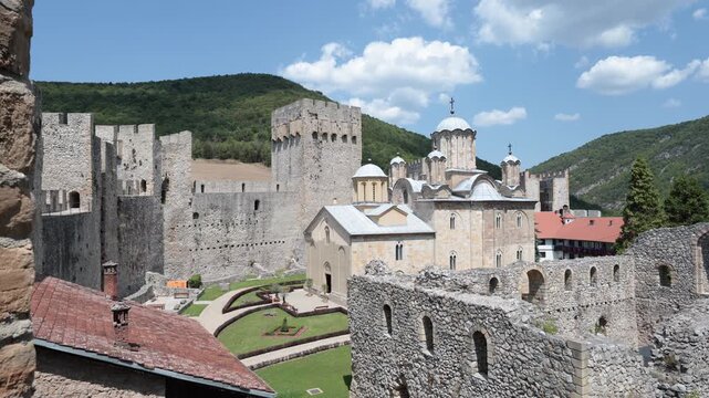 Central church building dedicated to Holly Trinity in Manasija Monastery, Serbia. Austere design, sandstone walls, represent religious European medieval architecture 