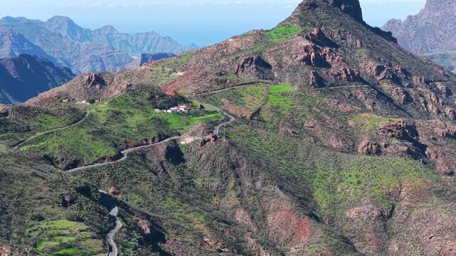 Roque Bentayga Aerial View with Mount Teide and Tenerife in Background, Gran Canaria Highlands, Spain - 4K Cinematic Summit