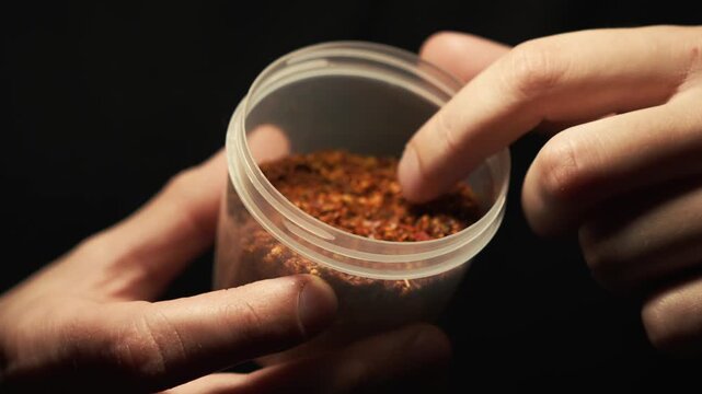 Ground aromatic spices to enhance the flavor of food.
Dried herbs for adding to food.
Close-up of dried paprika in a jar.
Food additives.
Culinary concept