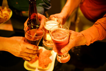 A blurry image of businessmen at a lavish office party.