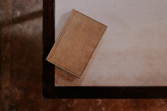 Vintage medical book placed on wooden table