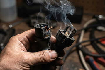 Close up of electronics soldering process with technician hands repairing circuit components, representing technology maintenance, precision work and hardware engineering.