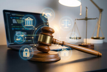 Digital law and justice technology concept with judge gavel and scales on desk, legal interface icons showing finance security property growth and modern judicial system.
