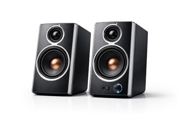 Obraz premium Small sleek computer audio speakers with powerful sound on clean white background