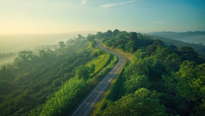 Aerial perspective of a countryside road highlighting seasonal change and rural accessibility